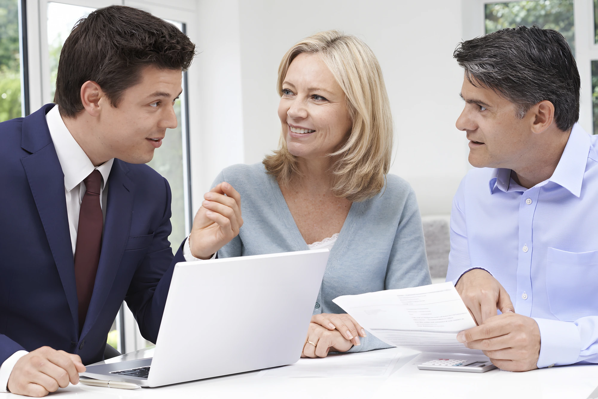 Business broker meeting with practice owners to discuss a practice sale