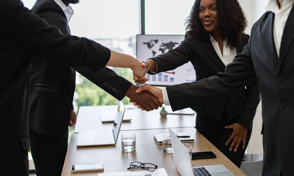 business people shaking hands